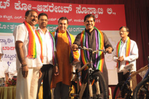 The event for distributing free notebooks, health cards, and bicycles to the beneficiaries was organized.