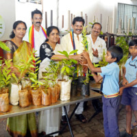 Distribution of Notebooks, Educational Materials, Felicitations & Saplings to School Children